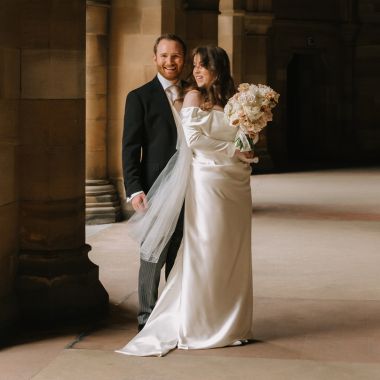 Wedding couple posing showcasing the stunning architecture and romantic atmosphere.